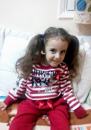 صور الطفلة كراسيفا ديفيد هاني المصابة بضمور العضلات الشوكي بالفيوم والتقارير الطبية الخاصة بها