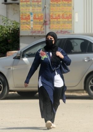 التزام المواطنين بارتداء الكمامات فى الشوراع بعد إلغاء حظر التجوال