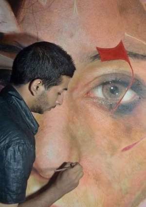 "أمل مصر".. "محمود" يرسم صورة "طبق الأصل" لـ"صلاح" والنجم ينشرها