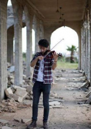 العراقي "أمين مقداد" يهزم داعش بالموسيقى