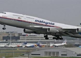 أقارب ضحايا الطائرة الماليزية المنكوبة يطالبون بتكريم موتاهم