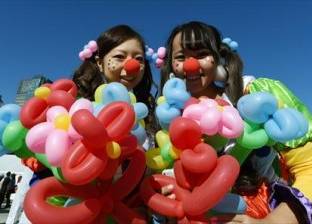 بالصور| 2000 ياباني يحتفلون بـ"الهالوين" مرتدين ملابس قناصة و"زومبي"