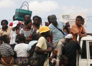 بالصور| "My Love" شاحنات نقل ركاب في موزمبيق: "امسك لتقع"
