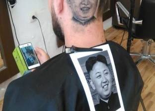 بالصور| حلاق يرسم صورة رئيس كوريا الشمالية على رؤوس زبائنه