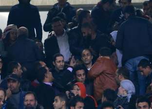 جمال وعلاء مبارك يحضران مباراة مصر وأوغندا بملعب برج العرب