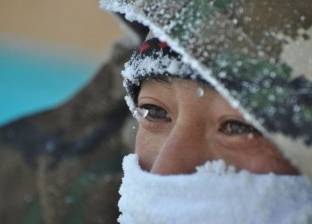 بالصور| "الثلوج" تعطل عشرات الآلاف من الصينيين عن الاحتفال برأس السنة القمرية