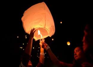 بالصور| الفلبينيون يحتفلون باليوم العالمي للمرأة بـ"مصابيح سماوية" و"كعب عالي"