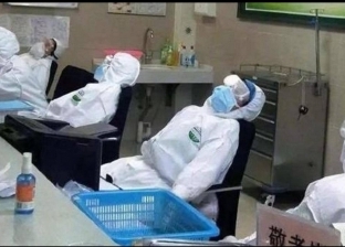 صور.. أطباء الصين يكافحون كورونا في أوضاع صعبة