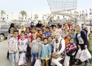 رغم كورونا والحظر: توزيع ملابس العيد على أطفال إمبابة