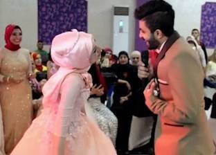 بالفيديو| عروس وعريس يفاجآن "المعازيم" بأغنية "ديسباسيتو"