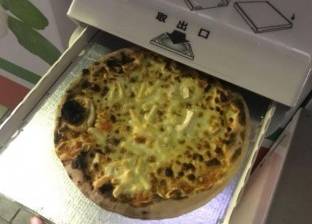 في "كوكب اليابان".. ماكينات لإعداد البيتزا في 5 دقائق