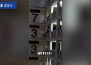 بالفيديو| لحظة سقوط قطة من الطابق 11 خلال عملية إنقاذها