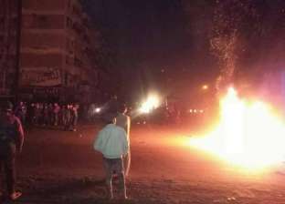 بالصور| محتجون على أحكام "مذبحة بورسعيد" يشعلون النيران في إطارات السيارات