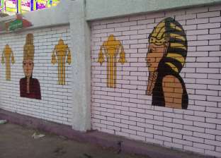 إزالة رسومات فرعونية خاطئة على سور مدرسة طه حسين في سوهاج