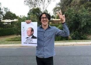 بالصور| "عمر" أصغر ناخب مصري بأستراليا يدلي بصوته في الانتخابات