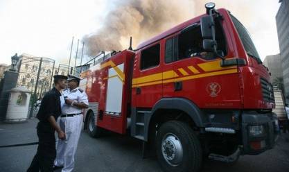 النيابة تعاين موقع حادث مصرع 3 أطفال في حريق شقة سكنية بالإسكندرية