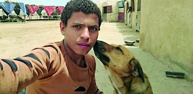 «محمد» وعلاقة حب مع كلب فى الجمعية