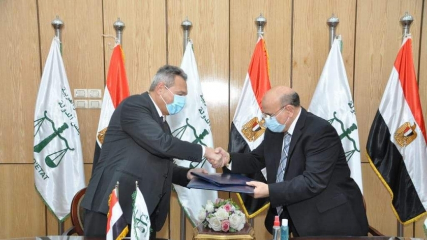 اثناء توقيع البروتوكول بين بنك مصر ومجلس الدولة