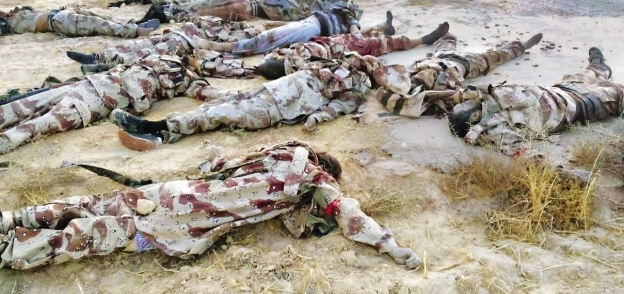 جثث عدد من الإرهابيين بعد قضاء قوات الأمن عليهم فى سيناء «صورة أرشيفية»