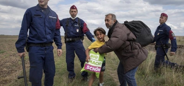 لاجئ وابنته