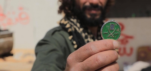 شعار "ألإخوان" لدي المليشيات المسلحة في ليبيا
