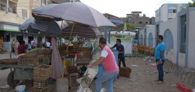 حملة مكبرة لرفع إشغالات السوق بمدينة عزبة البرج