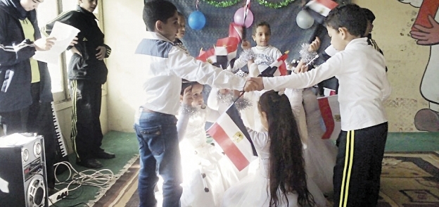 طلاب المدرسة خلال الاحتفال بفوز مصر