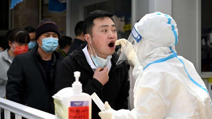 الكشف عن فيروس كورونا للوافدين في الصين