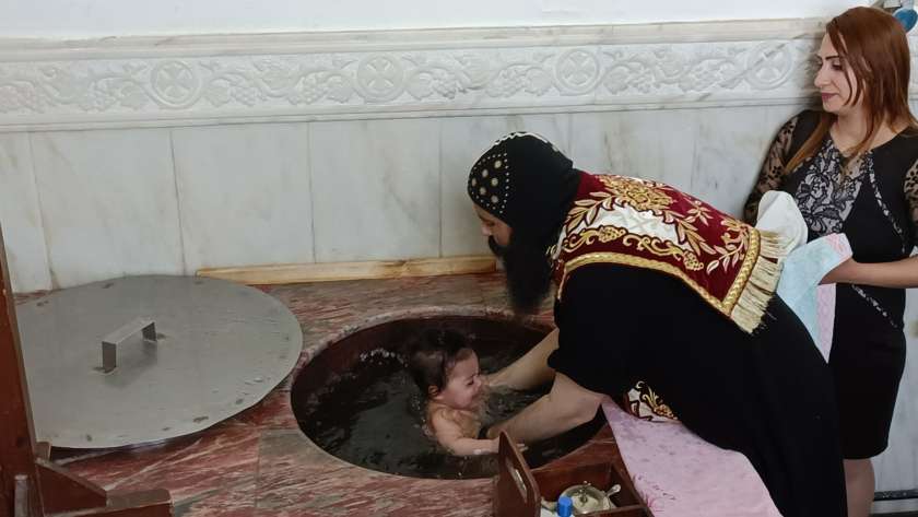 معمودية طفلة داخل دير مارمينا