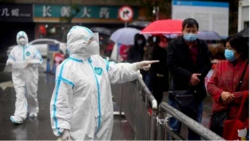 المواطنون فى الصين وسط تفشى فيروس كورونا