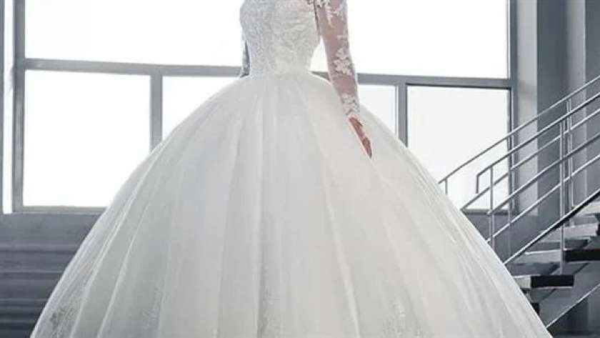 تفسير حلم لبس فستان الزفاف للعزباء- تعبيرية