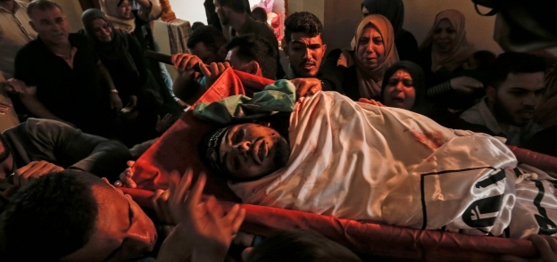 أحد الشهداء فى قطاع غزة أثناء تشييع جثمانه