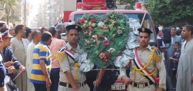 بالصور| جنازة عسكرية مهيبة لـ"عقل" شهيد الشرطة في سوهاج
