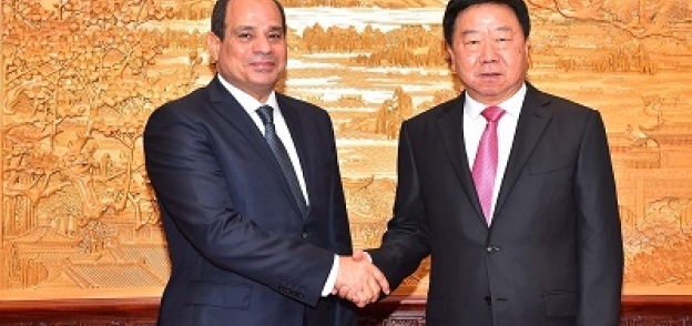 الرئيس عبدالفتاح السيسي مع رئيس الحزب الشيوعي الصيني