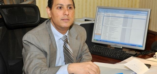 الدكتور محمد عمران رئيس البورصة