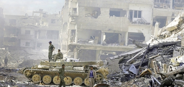 وحدات الأمن السورى تسيطر على مخيم اليرموك «أ. ف. ب»