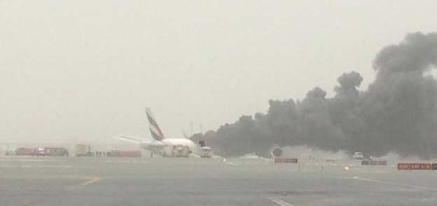 اندلاع النيران في طائرة دبي