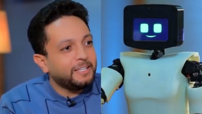 الإعلامي أحمد فايق مع الروبوت