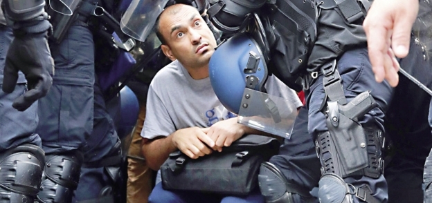 الشرطة تطرد «مهاجرين» من مخيم فرنسى