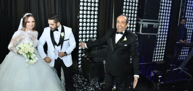 بالصور| تامر حسني وعدوية والليثي يحيون حفل زفاف ابنة أحمد صيام