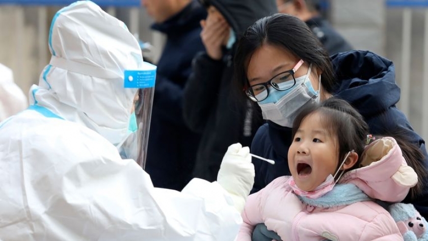 الصين تواصل فحوصات فيروس كورونا