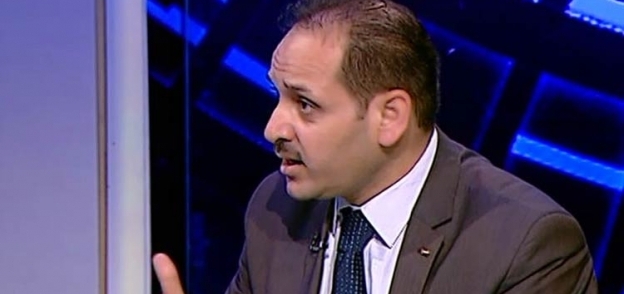 الدكتور أسامة شعث أستاذ علاقات دولية
