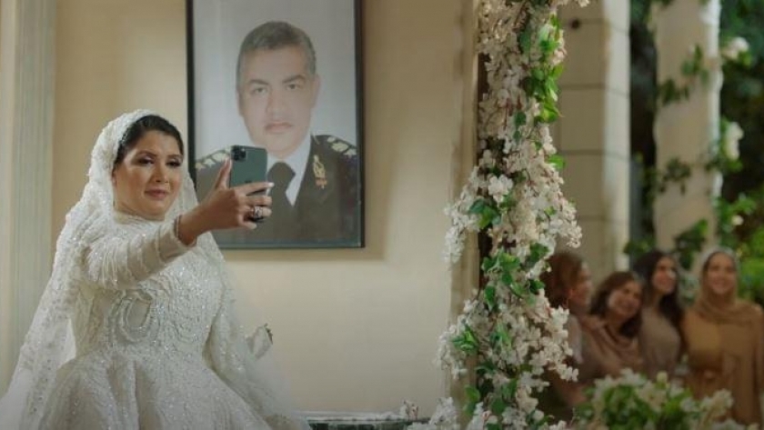 ابنه الشهيد عاطف الإسلامبولي أثناء زفافها