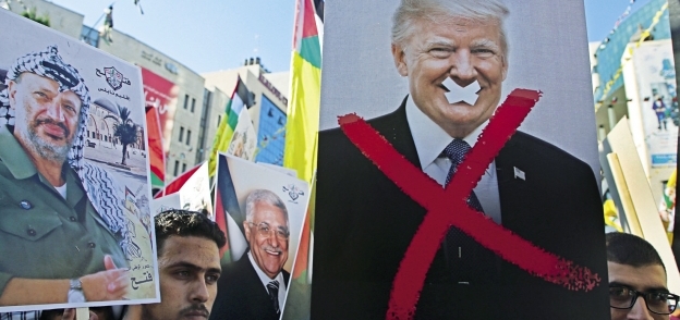 فلسطينيون يتظاهرون ضد «ترامب» بسبب دعمه للاحتلال «أ. ف. ب»