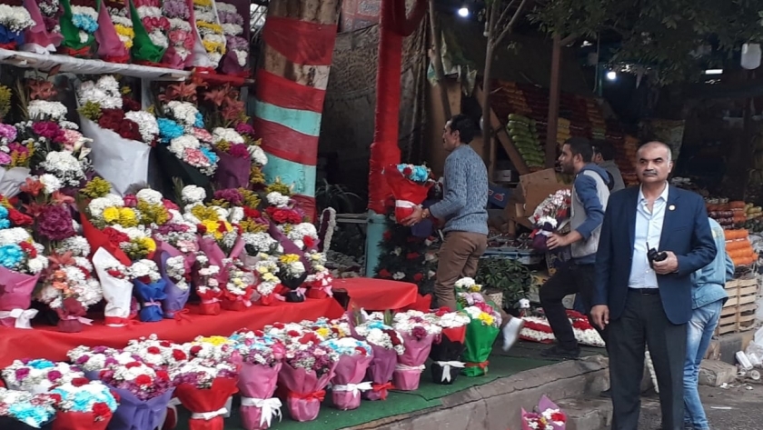 رفع اشغالات عيد الحب وتحرير محضر لمطعم مأكولات شهير بالدقي