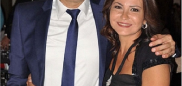 طارق علام وزوجته دينا رامز