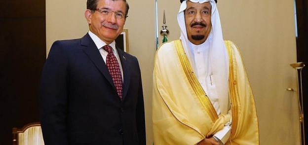 وزير الخارجية التركي والملك سلمان