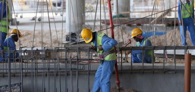 عمال مونديال قطر
