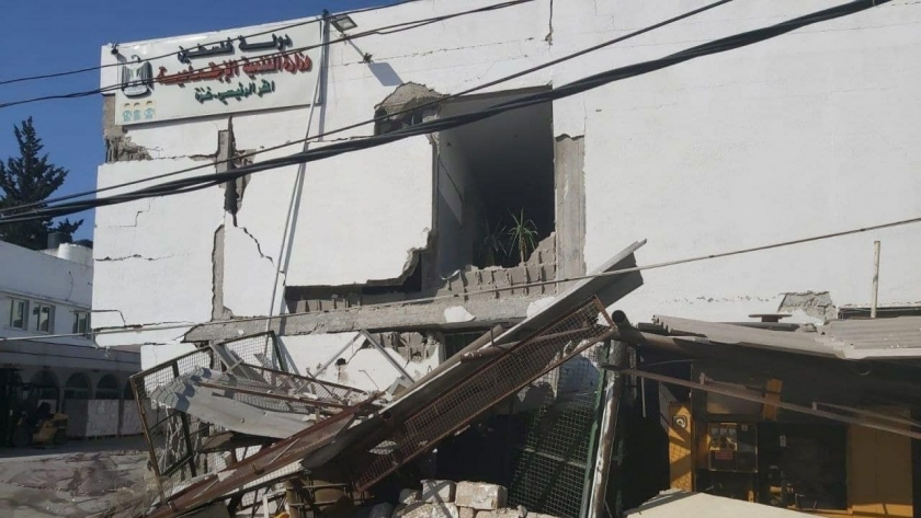 قصف أحد الأبنية بغزة- ارشيفية