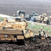 القوات التركية تنتشر فى منطقة «حسا» بالقرب من الحدود السورية «أ.ف.ب»